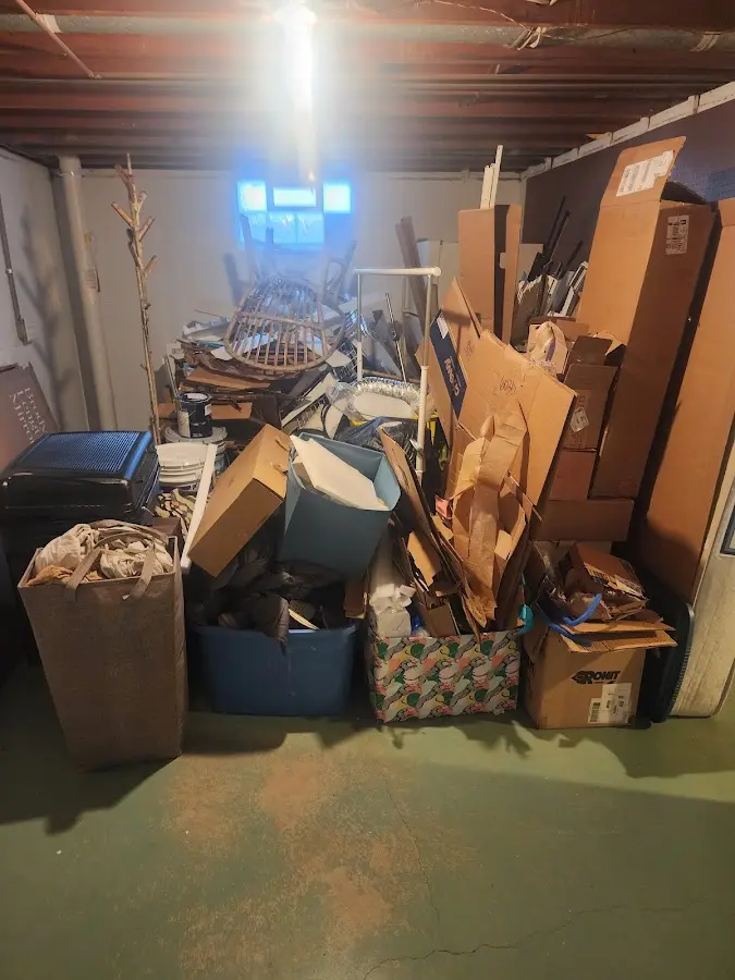 Roll-off dumpster container at job site for 40 Yard Dumpster Rental in Collegedale